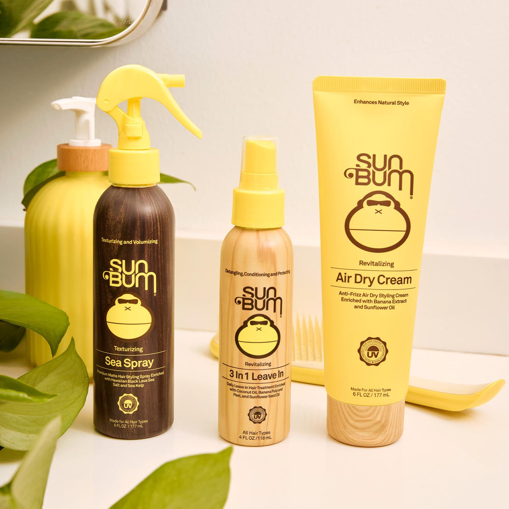 Sun Bum applied to towel-dried hair demonstrating smoother, enhanced natural texture