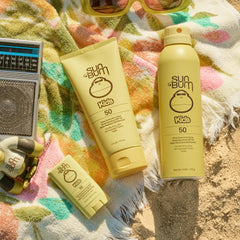 Sun Bum face stick held in hand to show travel-size 0.53 oz and easy portability