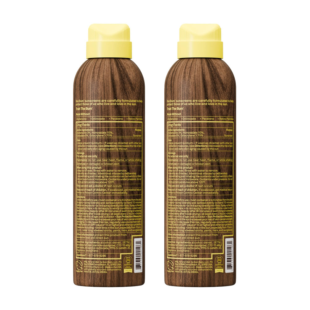 Sun Bum two 6 oz bottles beside a hand for portable size convenience