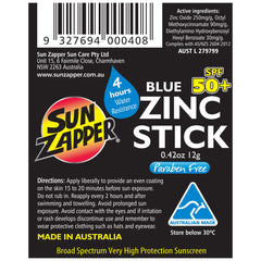 Family at the beach using Sun Zapper stick showing quick coverage for active days