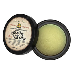 Sunny Isle pomade texture closeup showing smooth balm consistency and moisturizing oil sheen