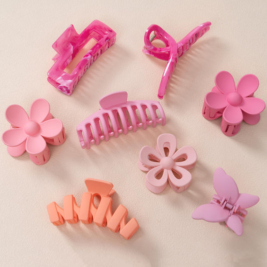 Sunolga front package view showing eight flower clips and neutral tones for versatile styling