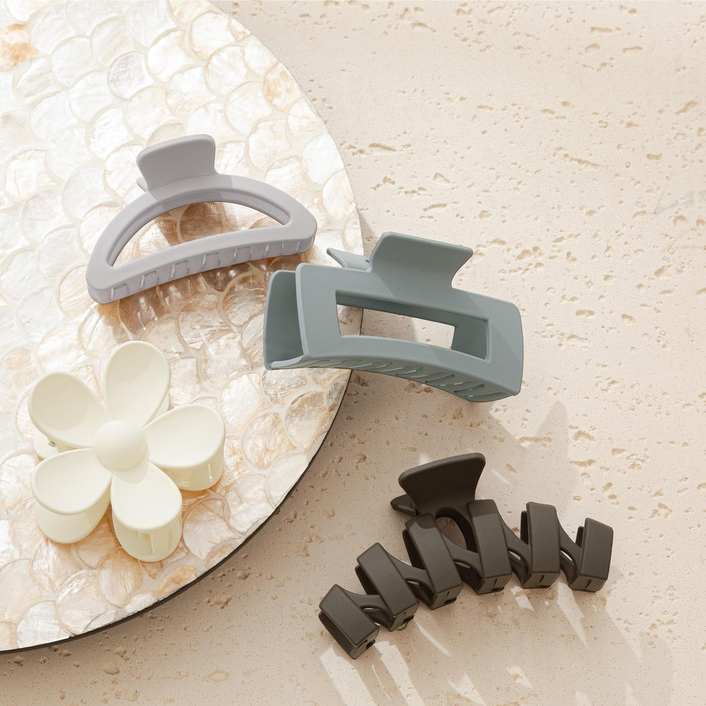 Sunolga clips arranged on vanity showing ready-to-wear styling benefit