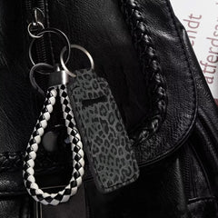 Suobstales pouch with chapstick inserted demonstrating secure fit and easy access