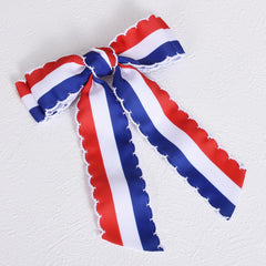 SUPCLIPS worn with patriotic outfit adding festive color and coordinated style