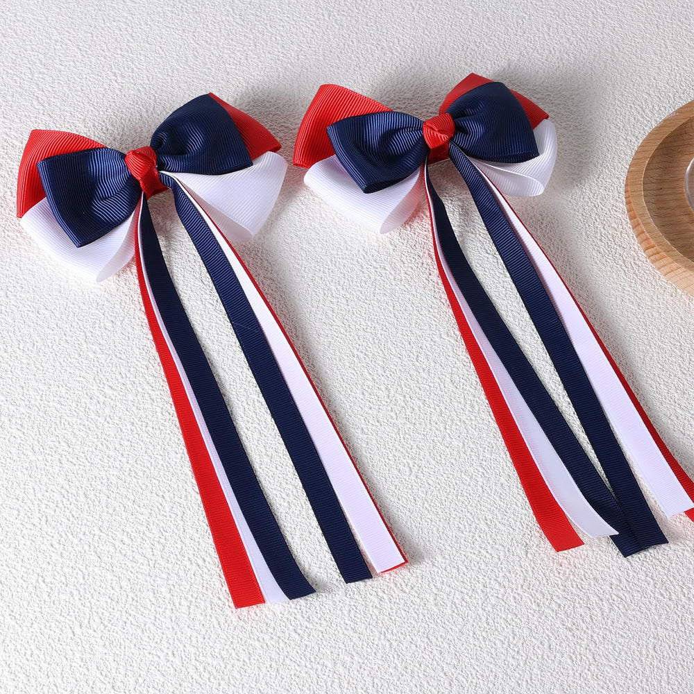 SUPCLIPS two-bow packaging view showing included pair and gift-ready presentation