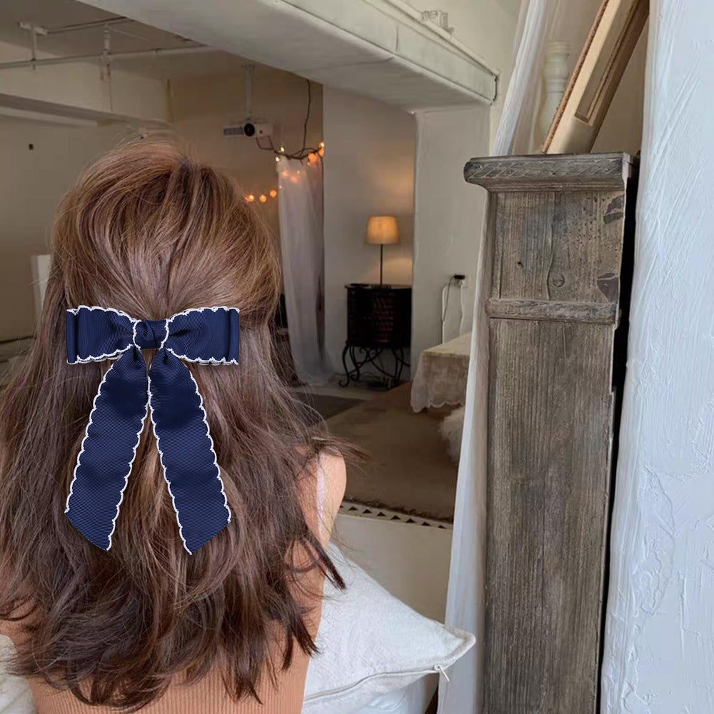 SUPCLIPS size comparison in hand indicating wearable scale and visibility