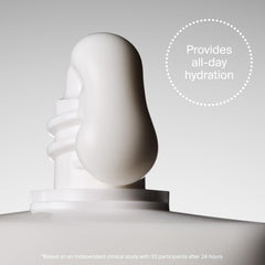 Supergoop! bottle held in hand to show true 18 fl oz scale and value
