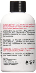 SuperNail liquid on brush during application demonstrating smooth control