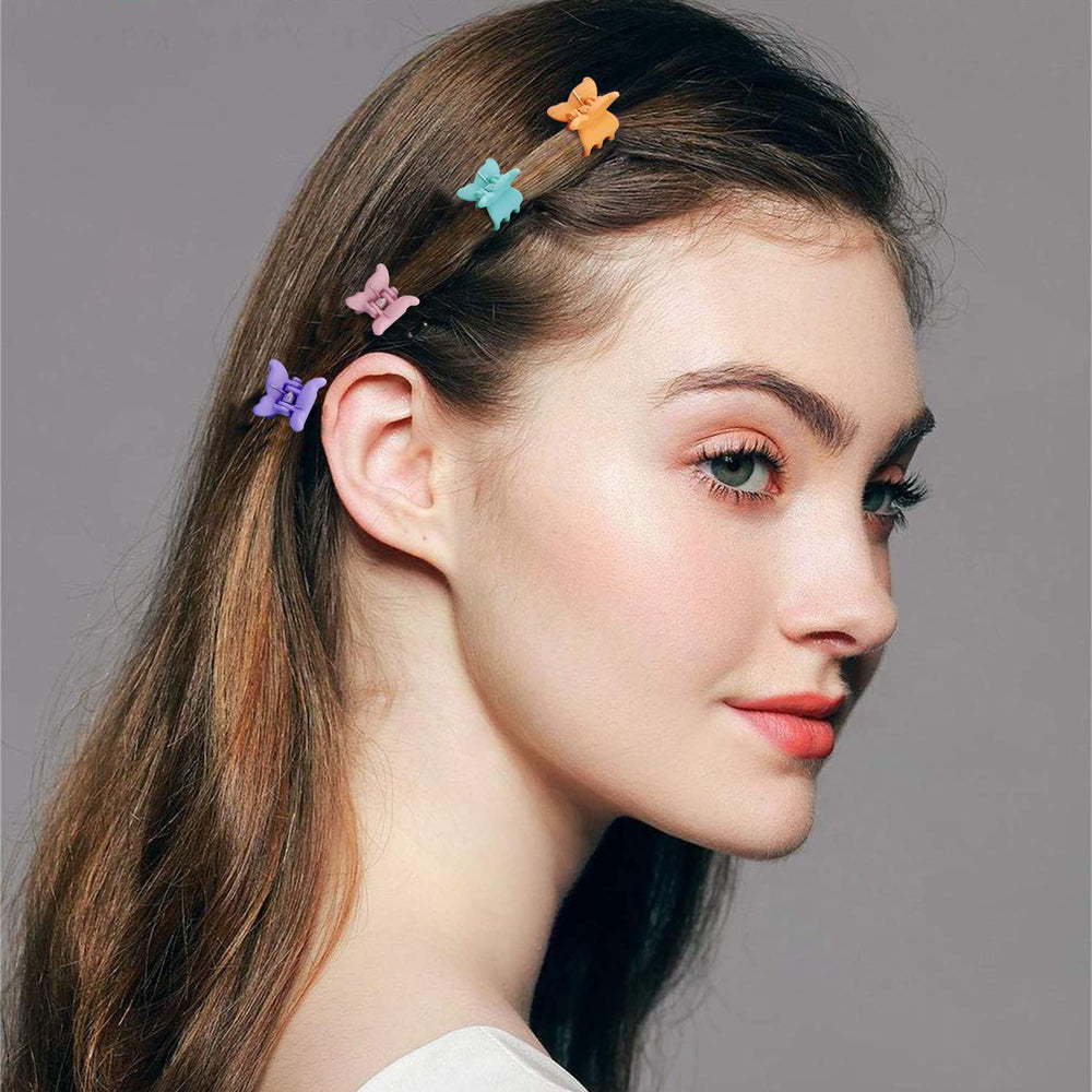 SuPoo butterfly clip close-up showing delicate shape and secure hold benefit