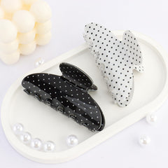 SuPoo acetate close-up highlighting glossy polka dot finish and durability