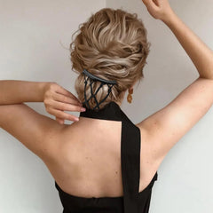 Suptizizkz comb next to hand illustrating size and easy everyday handling
