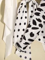 SUSULU scrunchie paired with outfit, neutral colorway complements clothes