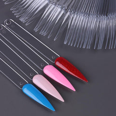 SUTOKAKA hand holding swatch set shows size and portability benefit