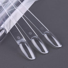 SUTOKAKA swatch sticks next to hand for size and scale clarity