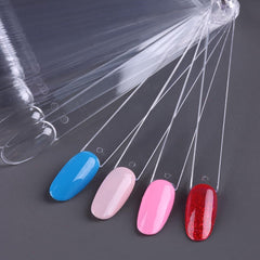 SUTOKAKA swatch sticks with polish samples demonstrating opacity