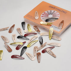 SWSTINLING hand holding several clips, clear size and travel convenience