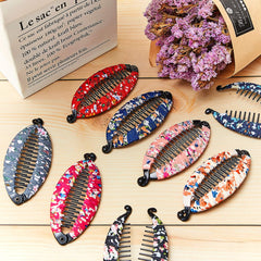 Syhood clips stored in a bag for on-the-go styling and quick touch-ups