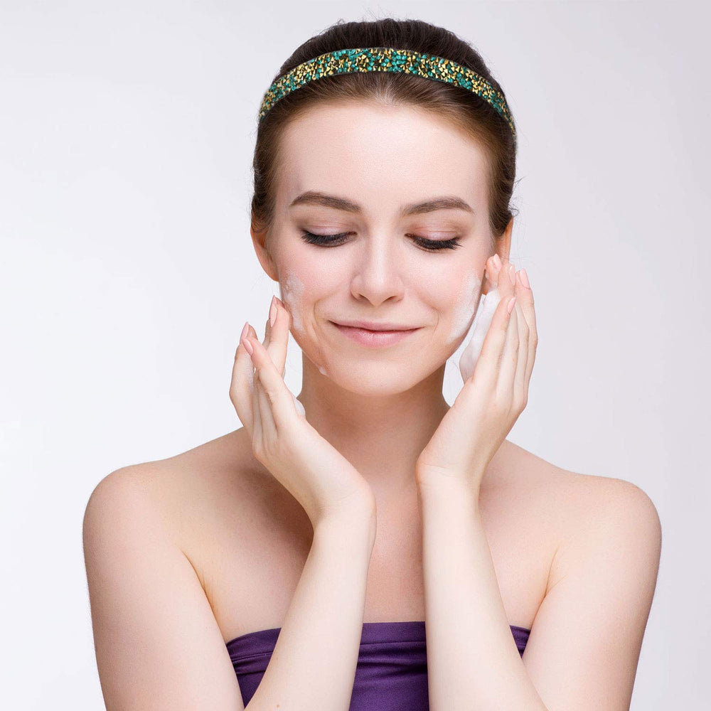 Syhood woman doing yoga wearing headband showing secure fit