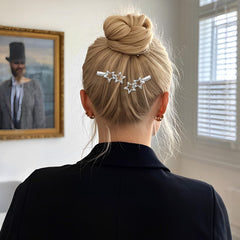 SynHHergyx clips worn in hair side profile showing hold and decorative benefit