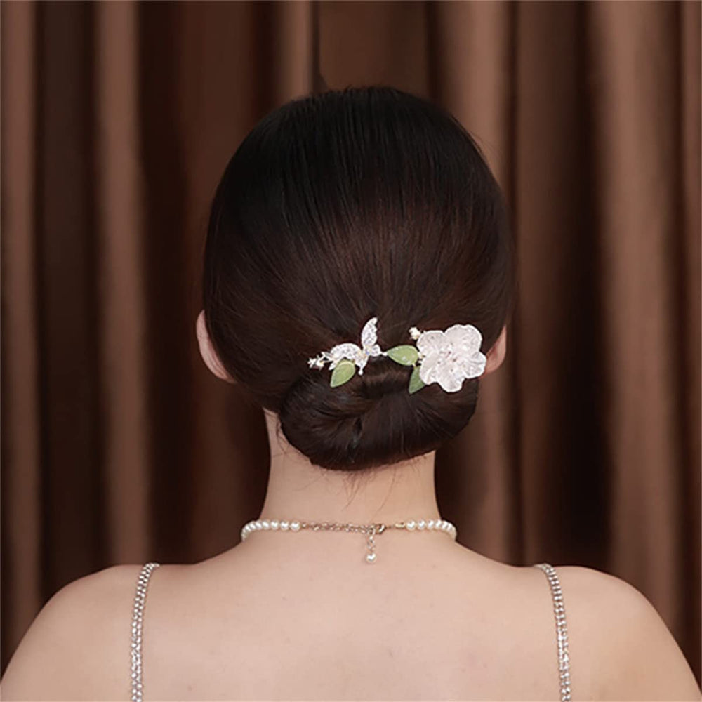 Takeberny finished French twist displaying smooth, professional-looking updo