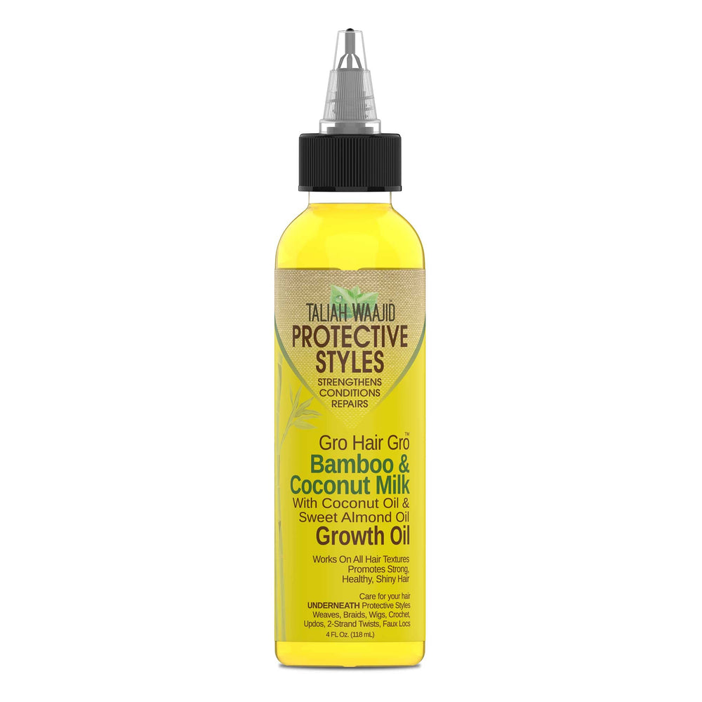 Taliah Waajid in-use lifestyle scene applying oil to scalp for nourishment and improved manageability