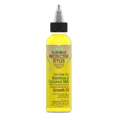 Taliah Waajid in-use lifestyle scene applying oil to scalp for nourishment and improved manageability