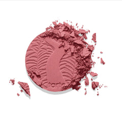 tarte blush being picked up with brush for precise application and controlled buildability