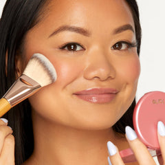 tarte seduce scale next to ruler indicating full-size compact dimensions