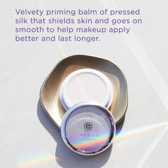 TATCHA swipe of primer on skin showing soft-focus finish benefit