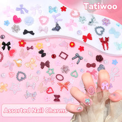 Tatiwoo charms held in hand to show scale and portability for on-the-go manicures