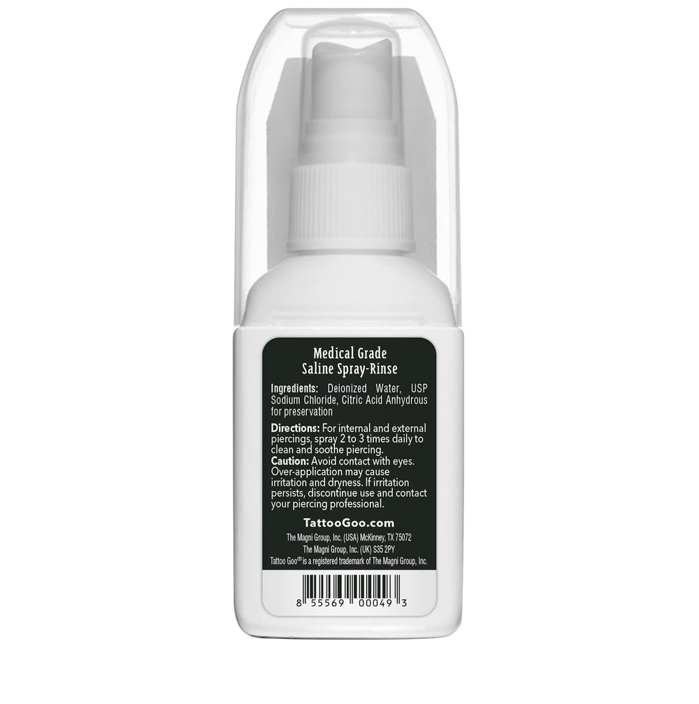Tattoo Goo mist dispersing over piercing demonstrating gentle, even saline rinse