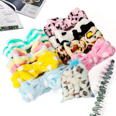 TDHDIKE headbands stacked in hand to show size and stretch for comfortable fit