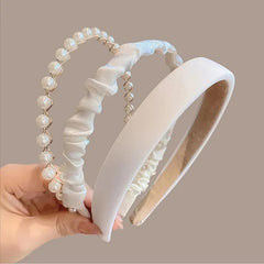 TEBIEKOY front view of three white pearl headbands showing elegant set and benefit