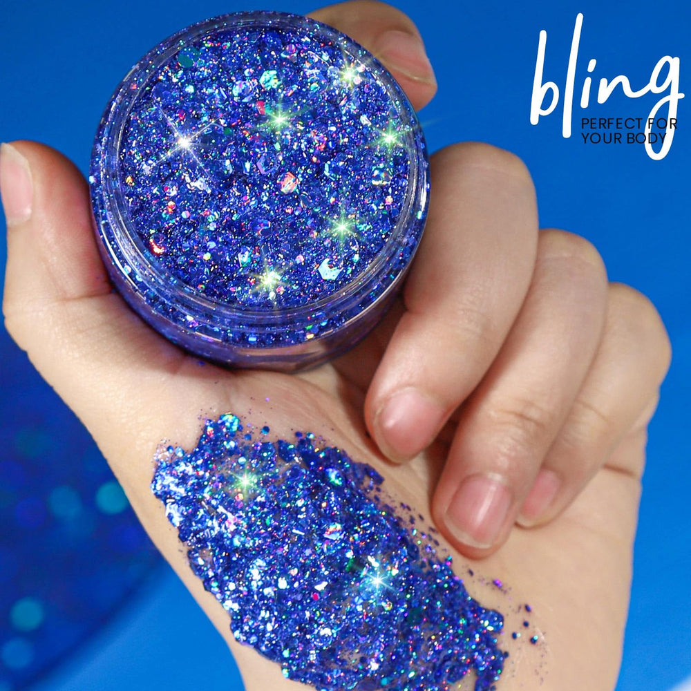 Teenitor blue glitter applied to cheekbone for high-shine festival highlight