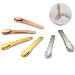 Tekson front view of six metal spatulas showing colors and neat storage benefit