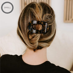 TELETIES clip used while lying down showing low-profile comfort and stability