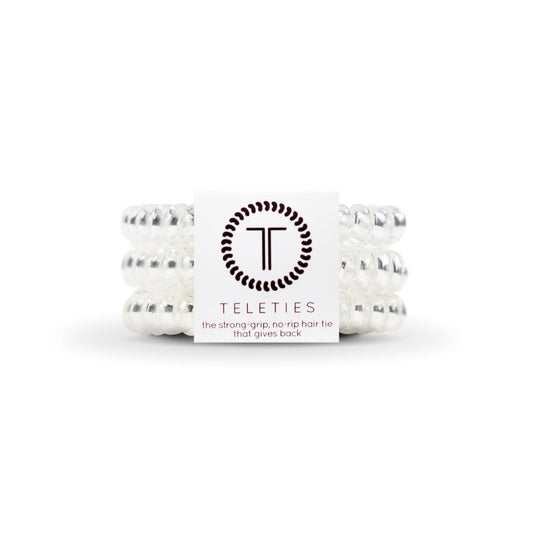 Teleties front packaging showing three crystal clear coils and easy-grip benefit