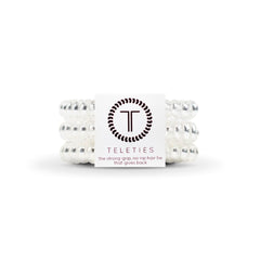 Teleties front packaging showing three crystal clear coils and easy-grip benefit