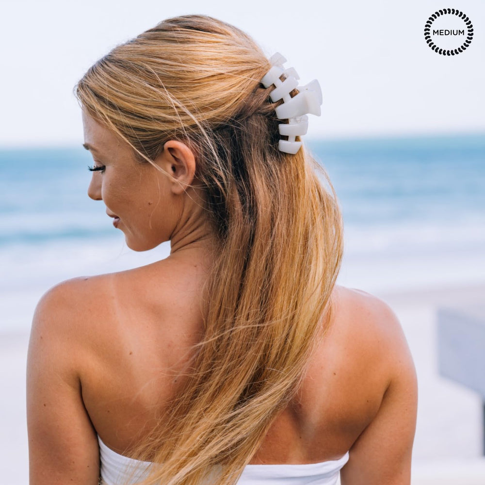 TELETIES medium clip holding half-up hairstyle for secure style