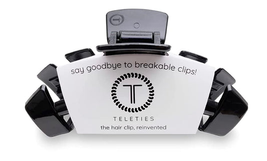 TELETIES medium clip front view showing sleek jet black finish and secure hold