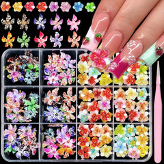 Tephrent front packaging showing 120pcs floral nail charms and kit benefits