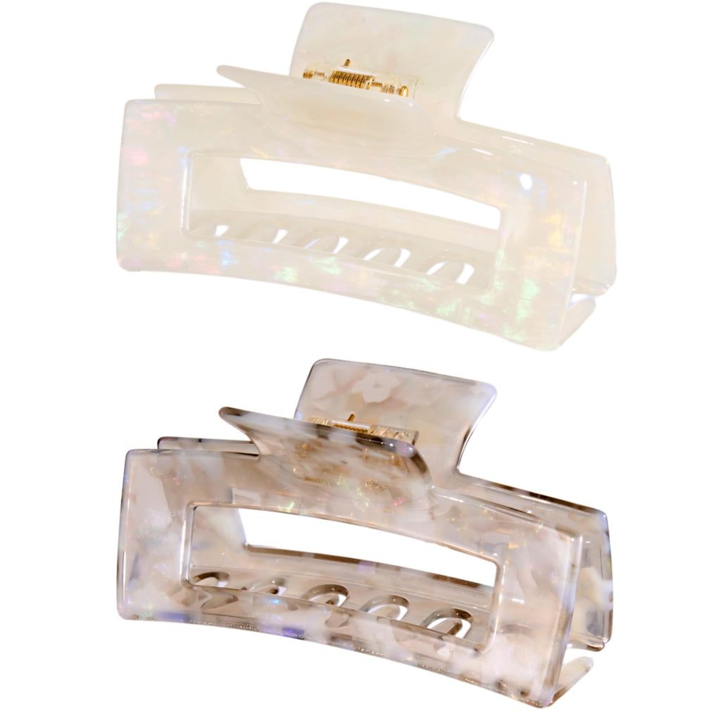 Textention front packaging showing two tortoise shell clips for stylish secure holds
