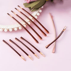 Textention short bobby pin close-up showing compact size and gentle removal benefit