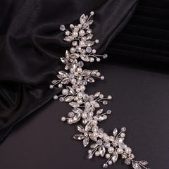 Teyglen close-up of rhinestones and imitation pearls highlighting handcrafted detail