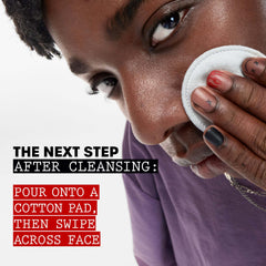 Thayers toner pouring onto a cotton pad to remove impurities effectively