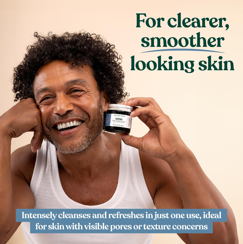 The Body Shop charcoal mask being applied on face showing deep-clean benefit