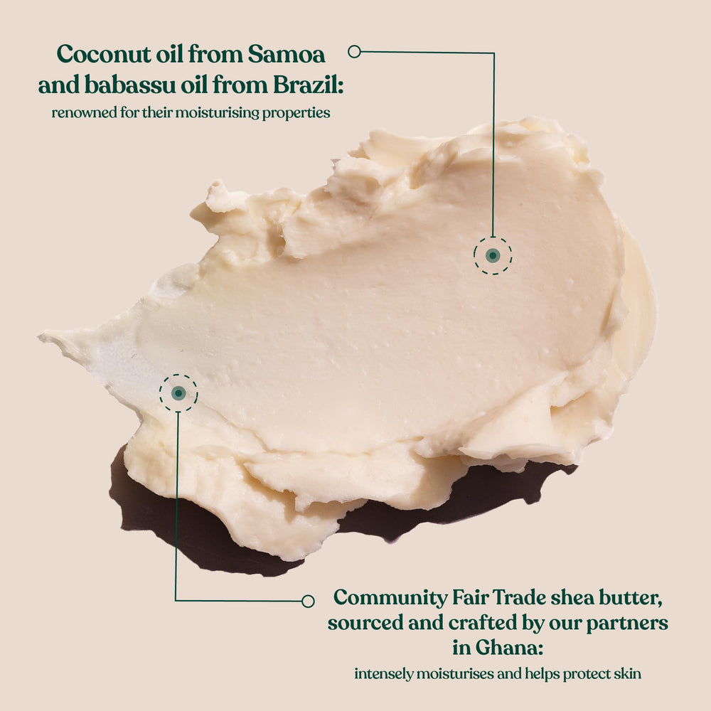 The Body Shop coconut body butter open jar close-up texture, rich melt-on-skin feel