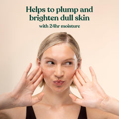 The Body Shop moisturizer in hand to show travel-friendly size benefit