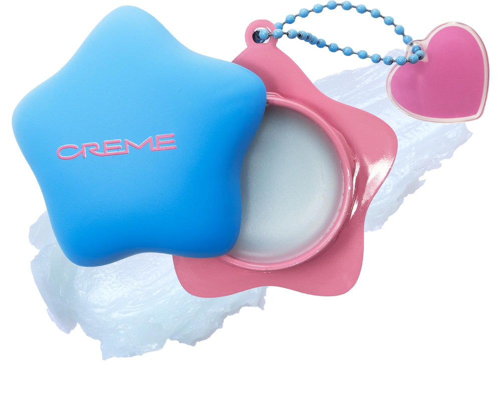 The Crème Shop front packaging showing the mint lip butter charm and star keychain for easy access